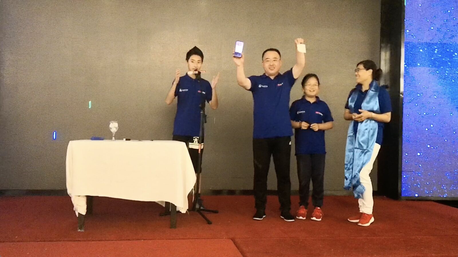 Sihan Fu on stage for company party on August 16, 2018